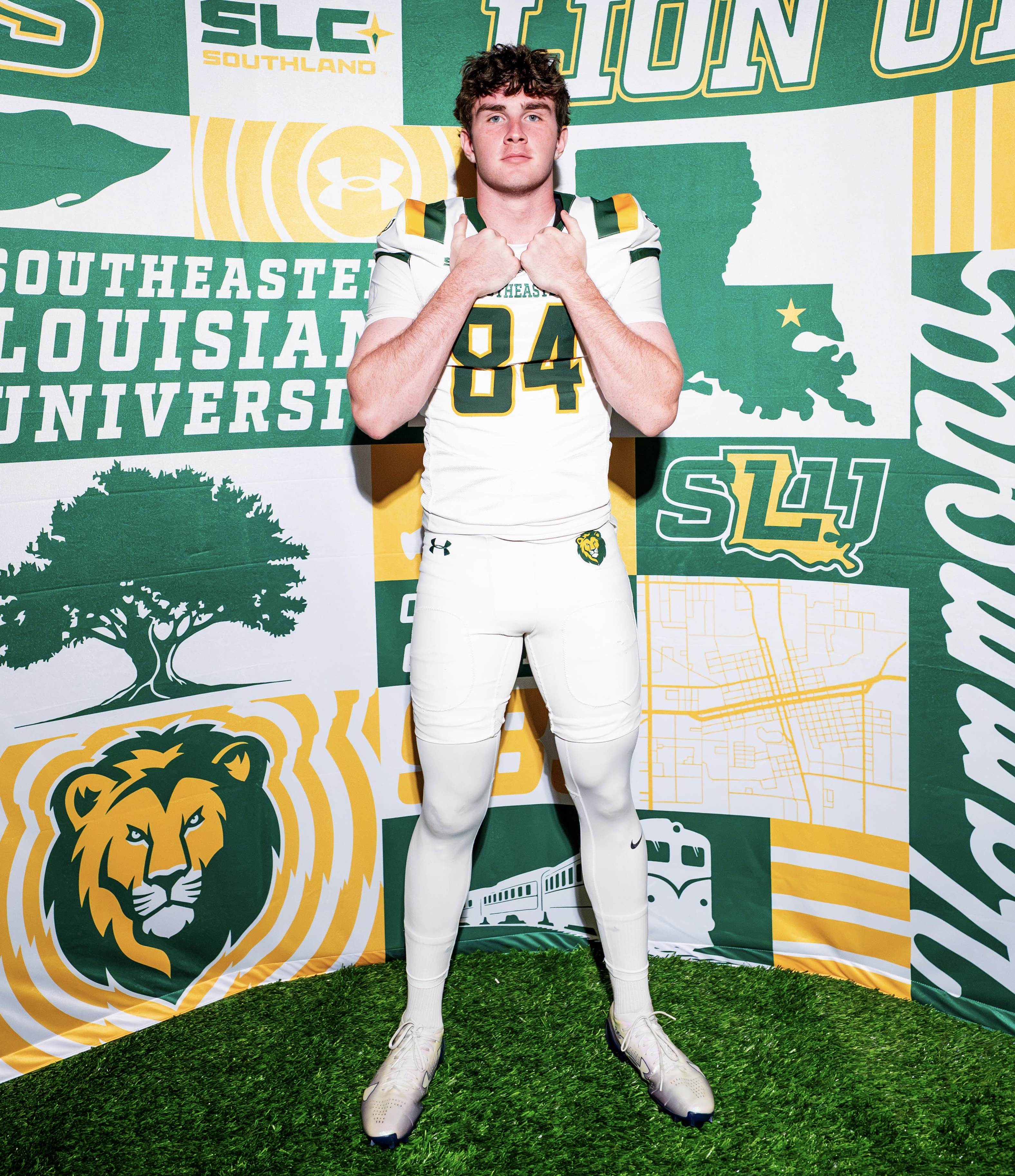 Charlie in his #84 Southeastern Louisiana uniform at the SLU photo wall
